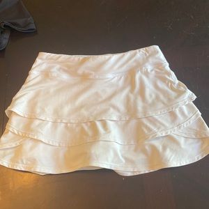 White Athleta girl tennis skirt size L/12
